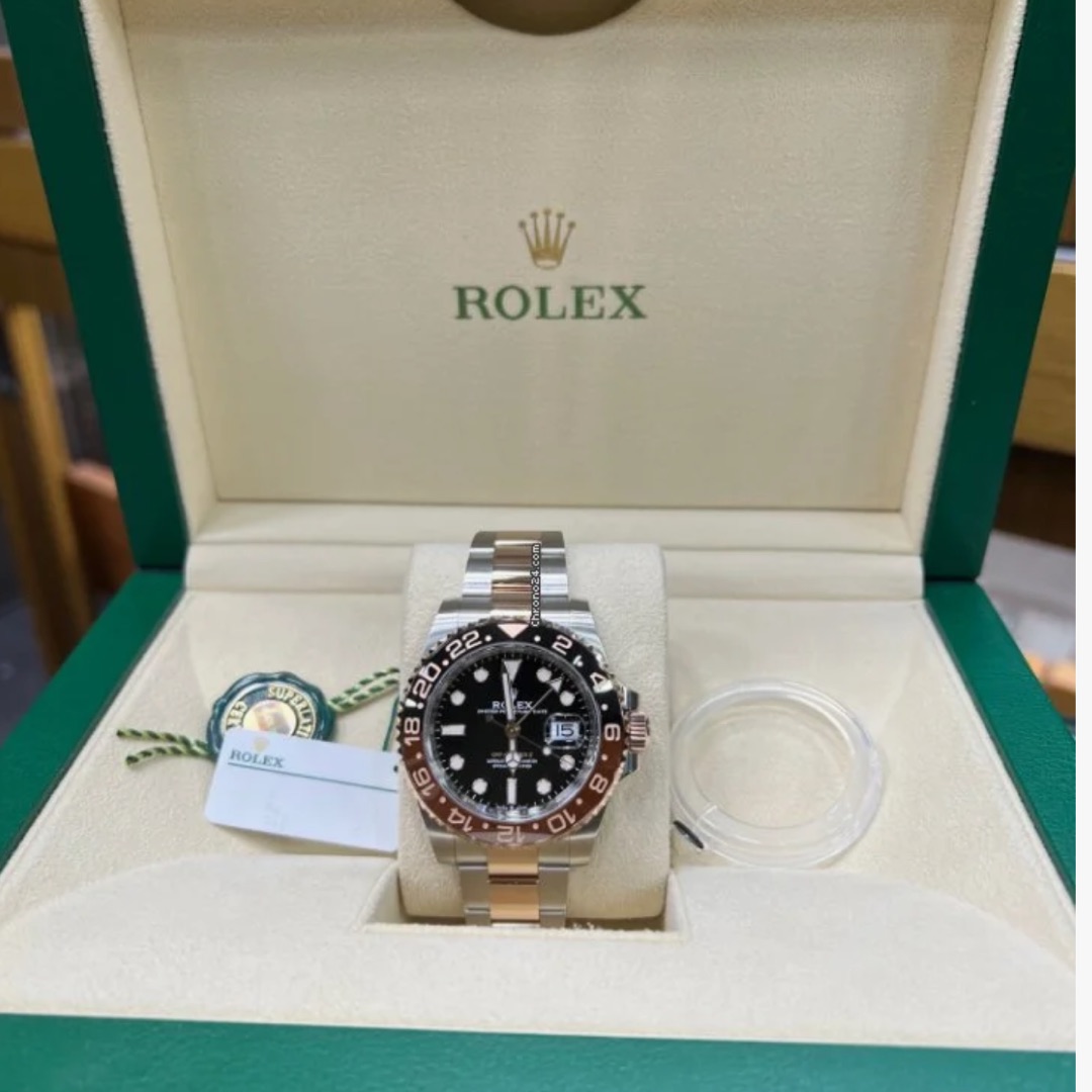 Rolex GMT-Master II Black Dial Gold Steel Bracelet $24,000.00
