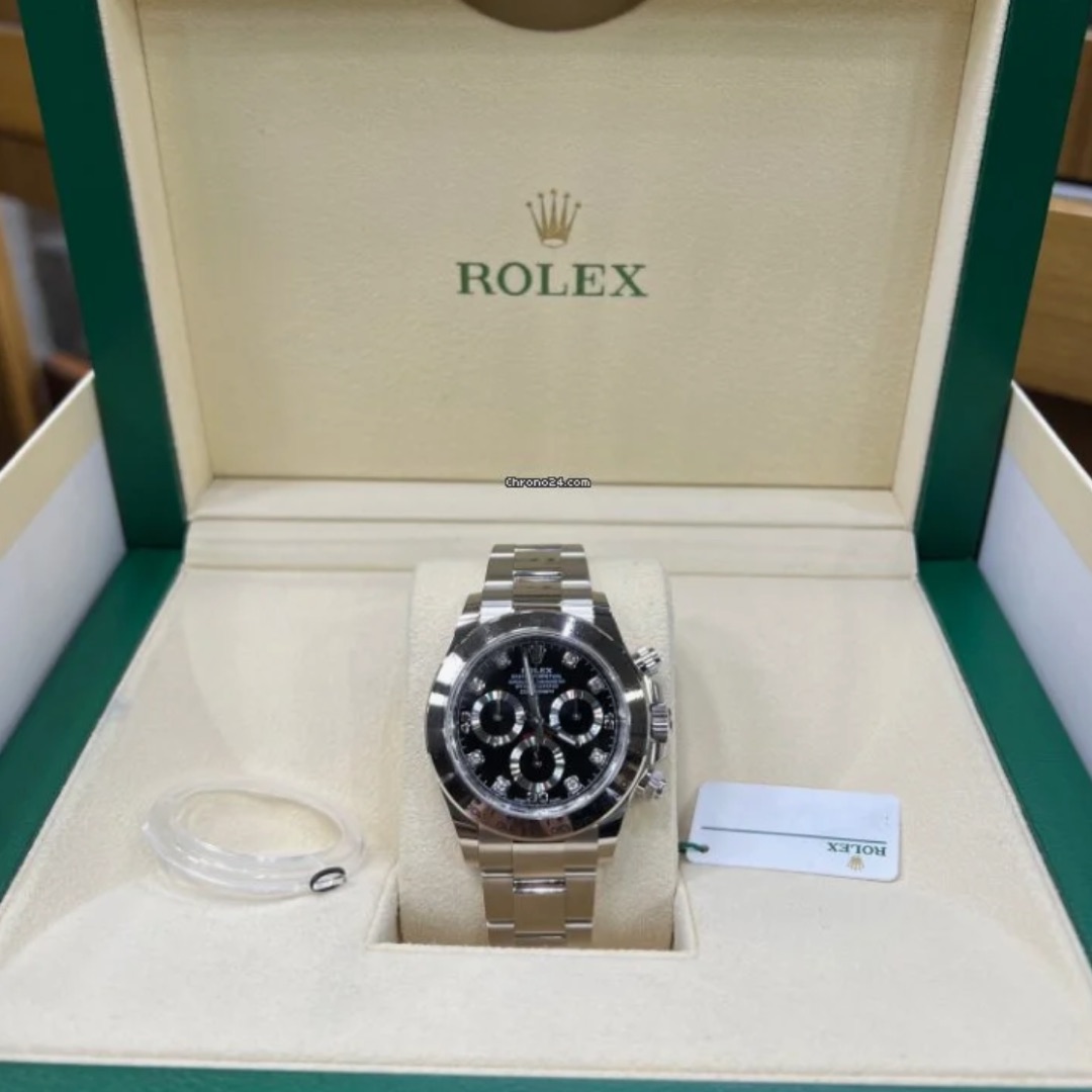Rolex Daytona Black Dial White Gold Bracelet $57,500.00$ - Winder